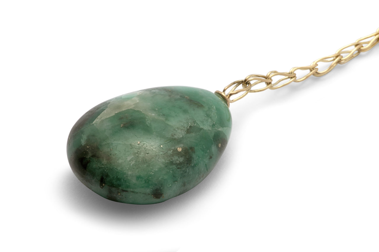 Handmade gold chain lariat with a hand cut moralla emerald